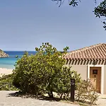 Resort Baia Di Sardinia, Curio Collection By Hilton